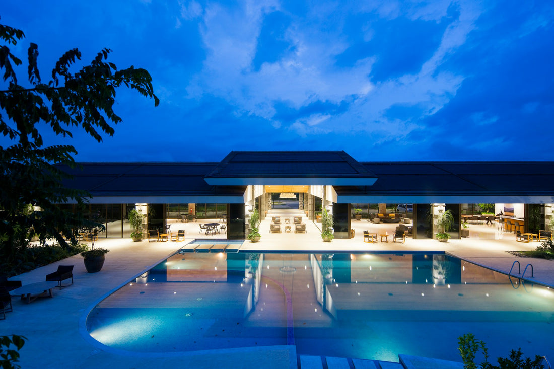 Wide angle shot of large pool after sunset