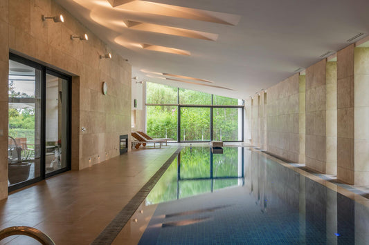 A well lit indoor pool